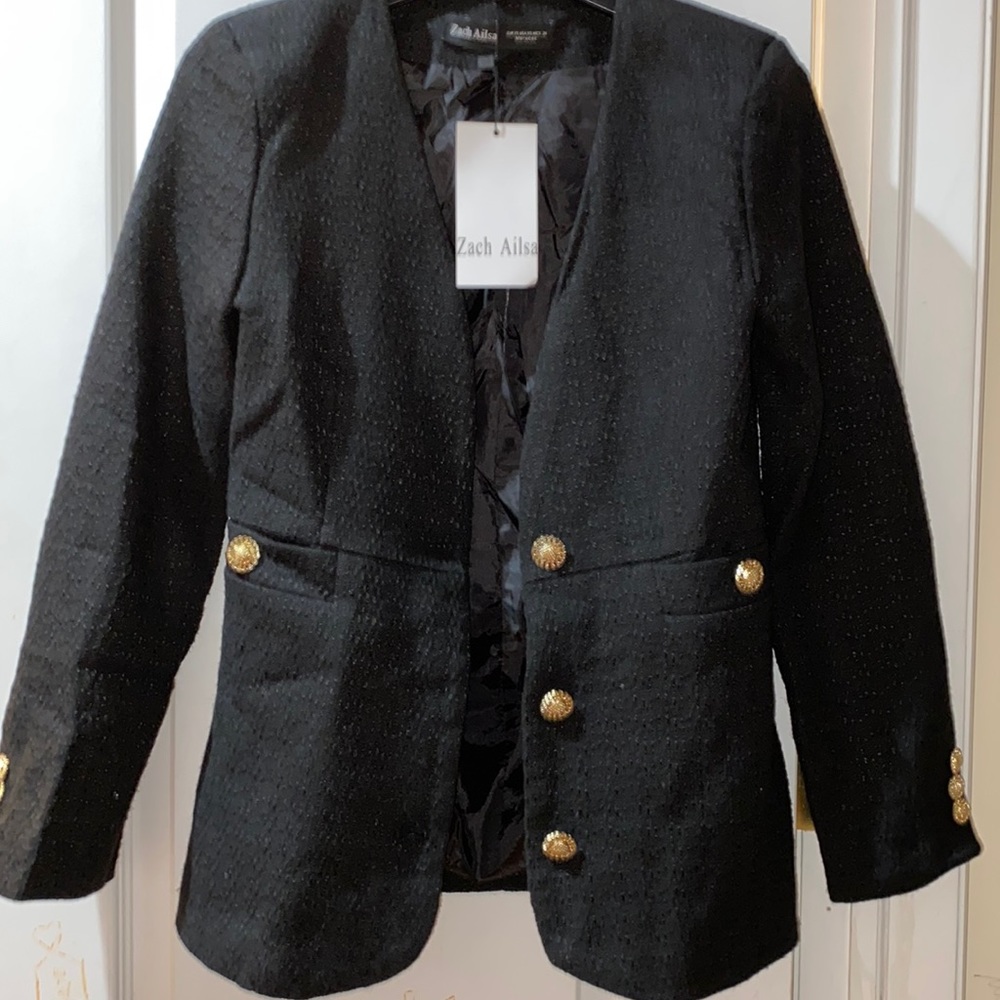 Black v neck blazer with cold buttons (no collar). New with tags and never worn.